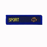 blue rectangle woven badge with the word sport sewn in yellow in capital letters and a gold trefoil after the writing
