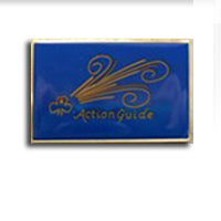 metal badge with blue enamel front with the trefoil, the words Action Guide and stripes all in gold on a blue background