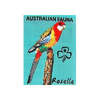 unbound badge with a multi coloured rosella sitting on a tree stump with the trefoil and writing in black on a turquoise background