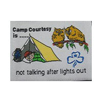 Unbound fun badge. Wording - Camp Courtesy is not talking after lights out. Embroidered picture of a Guide in a tent and two owls on a branch on a white background.