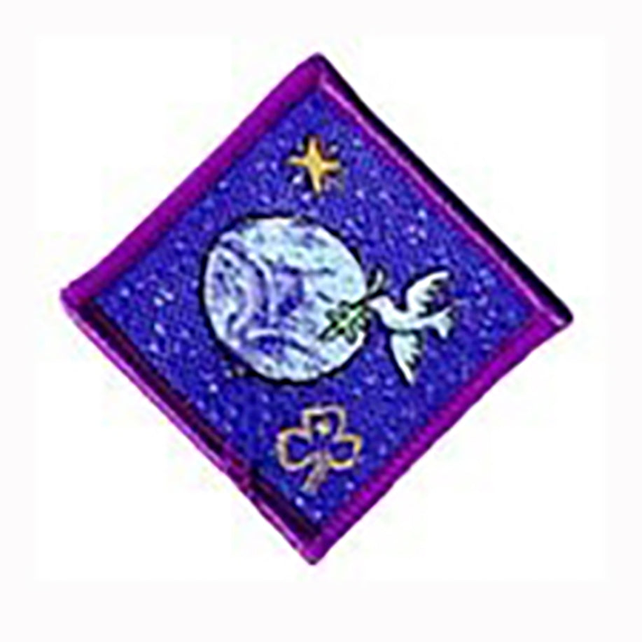 diamond shaped bound in purple badge with an image of the globe and a dove on a blue background