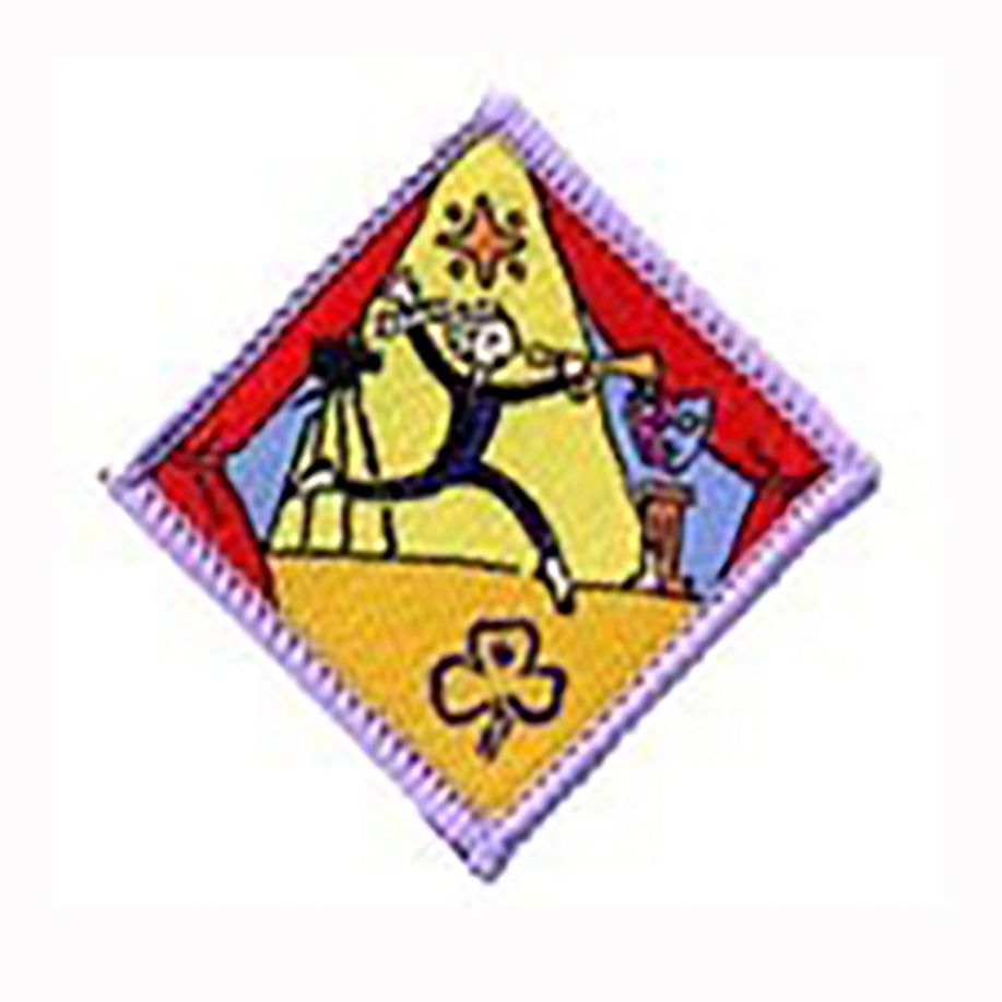 diamond shape badge bound in purple with a girl dancing on the front