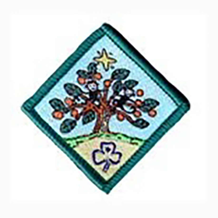 diamond shaped bound in green badge with a tree with two monkeys in it