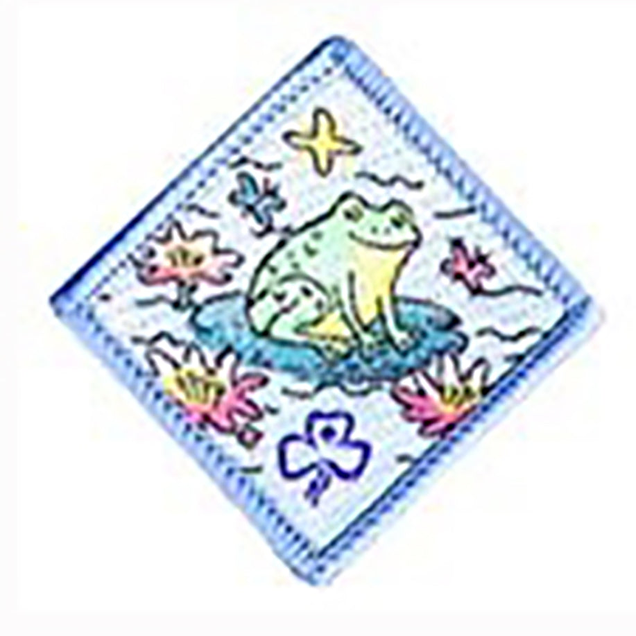 diamond shaped badge bound in light blue with a frog sitting on a lily pad