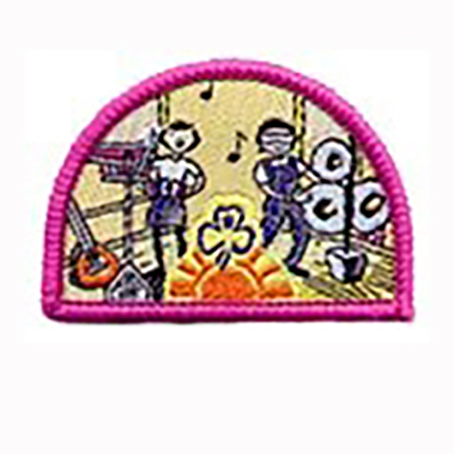 semi circle shaped badge bound in pink with two girls singing and playing musical instruments
