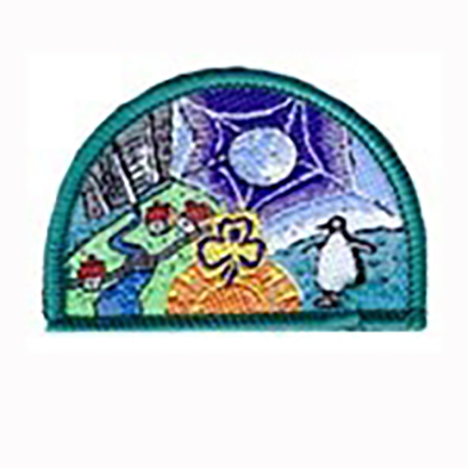 semi circled shaped badge bound in aqua with a picture of houses, the moon and a penquin