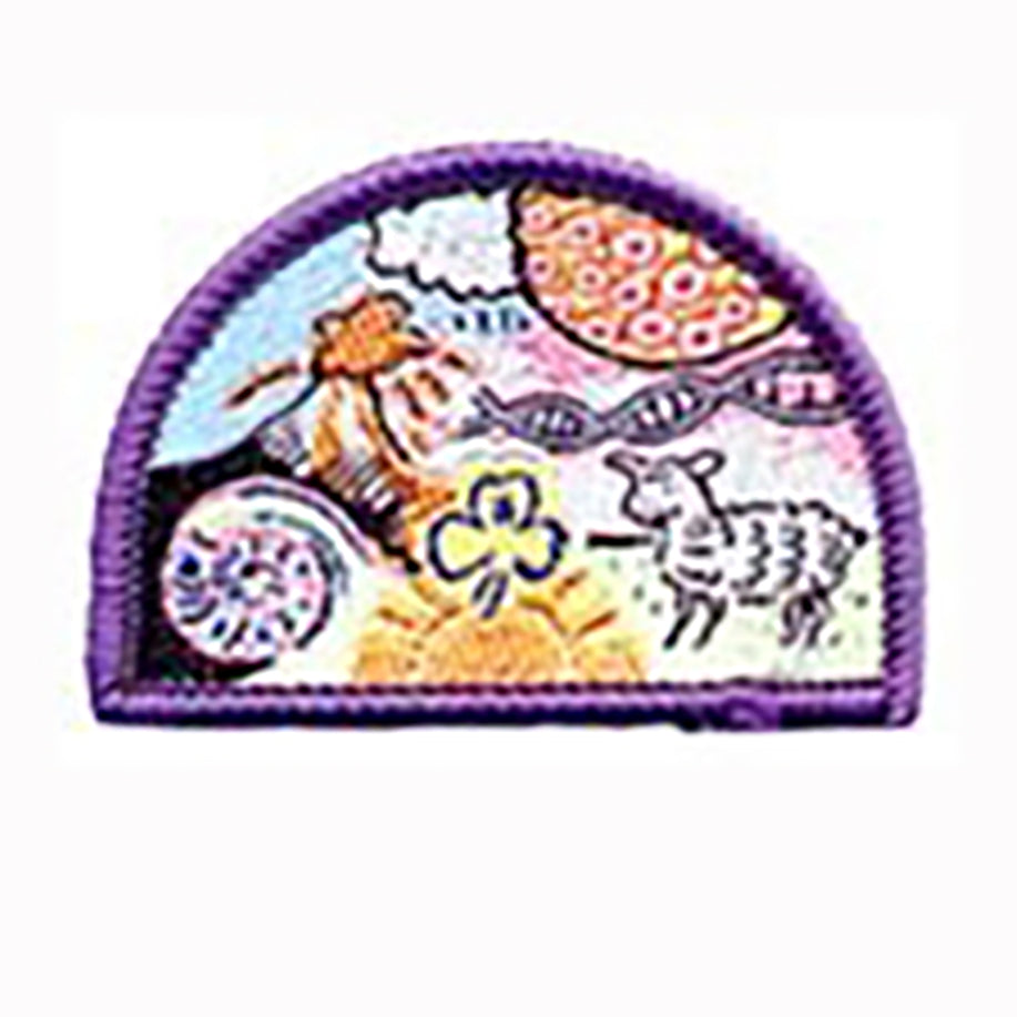 a semi circled shaped badge bound in purple with a picture of a sheep, shell, bird and a DNA strand on it