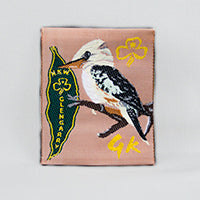 square unbound fun badge with glengarry written down a green leaf and a kookaburra sitting on a branch