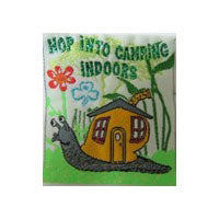 unbound cloth badge with a slug with a house on its back with the words hop into indoor camping in green