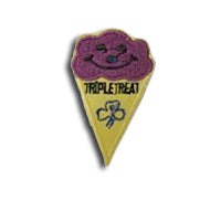 a yellow ice cream cone with triple treat written on it with a purple scoop on top