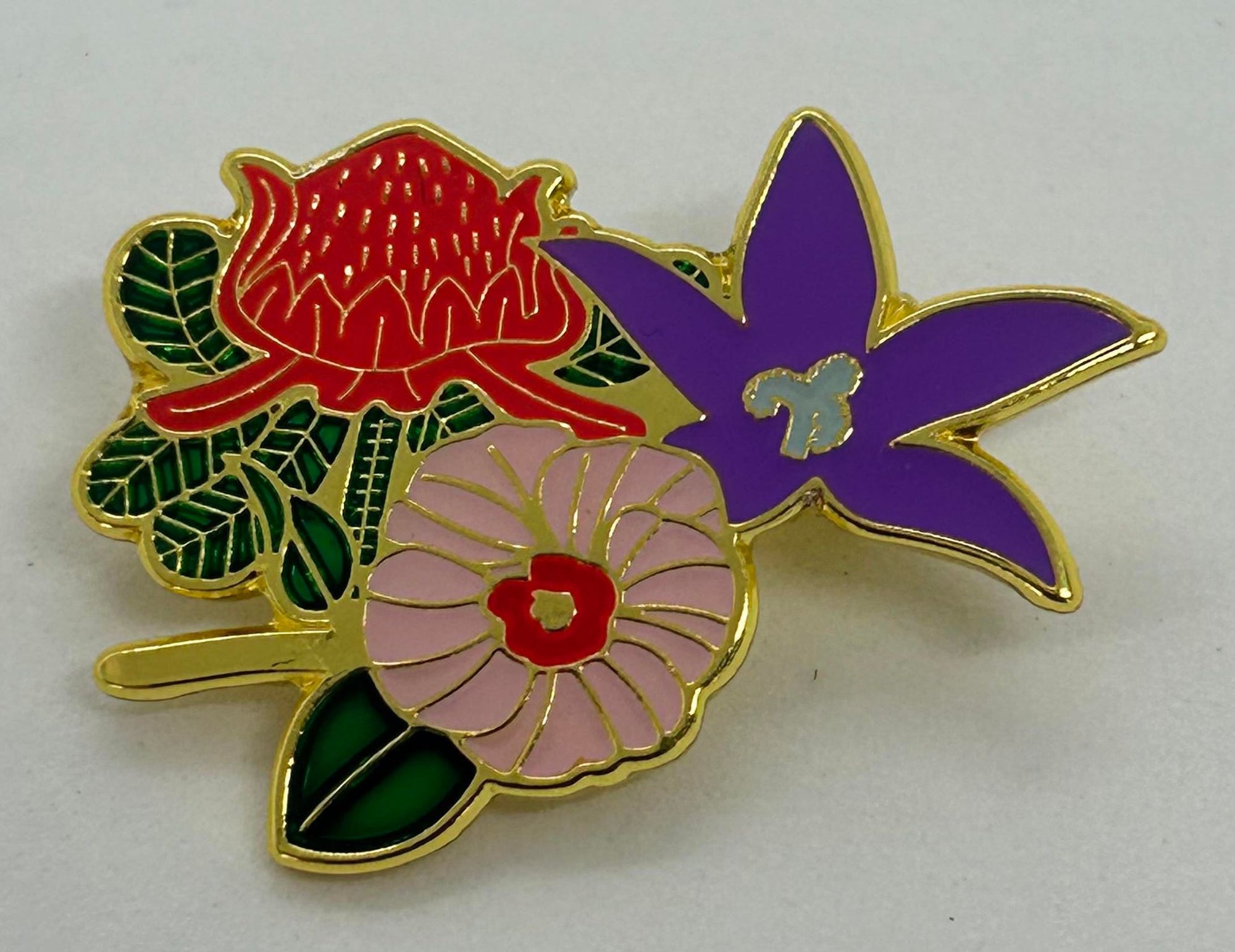 NSW ACT NT floral badge in metal