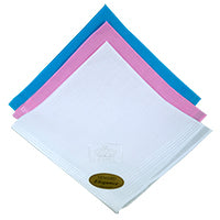 a white hankie with the queens guide emblem embroidered in one corner