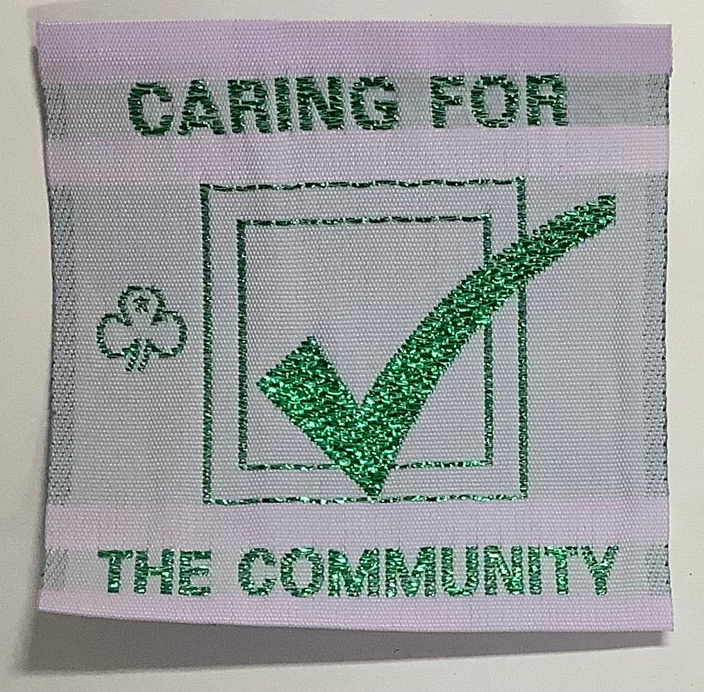 a square unbound badge with a green tick on a white background