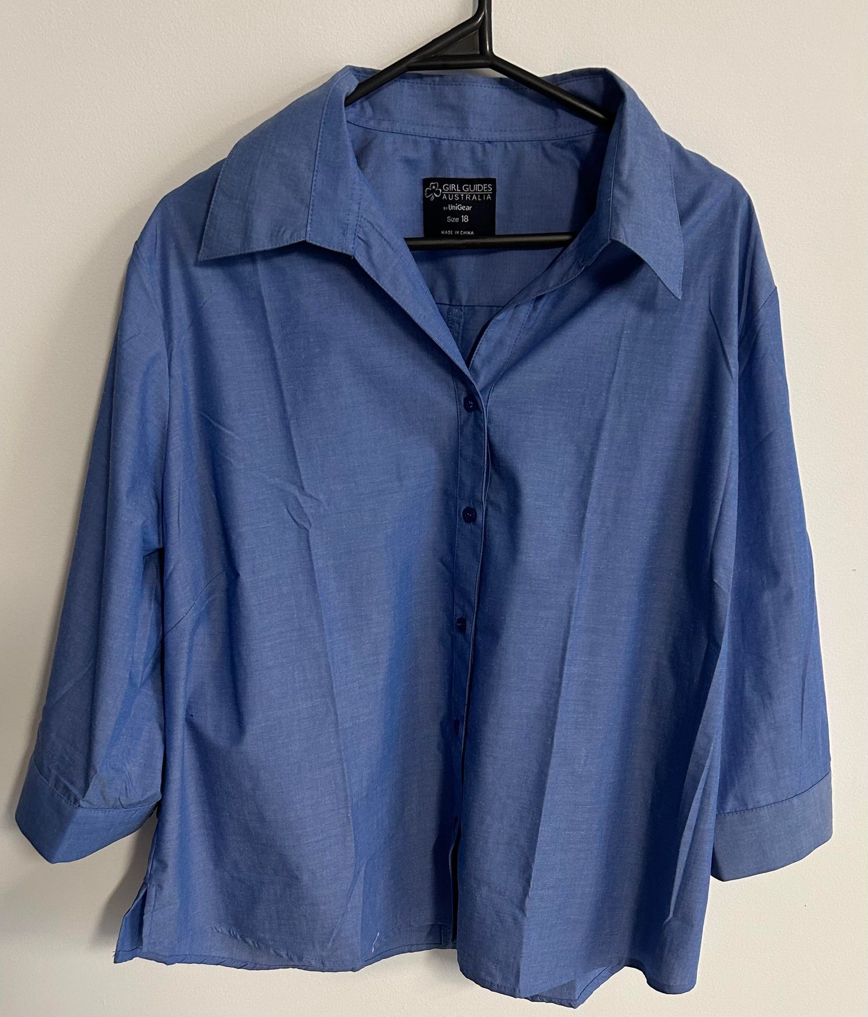 a blue chambray shirt with three quarter sleeves for senior guides