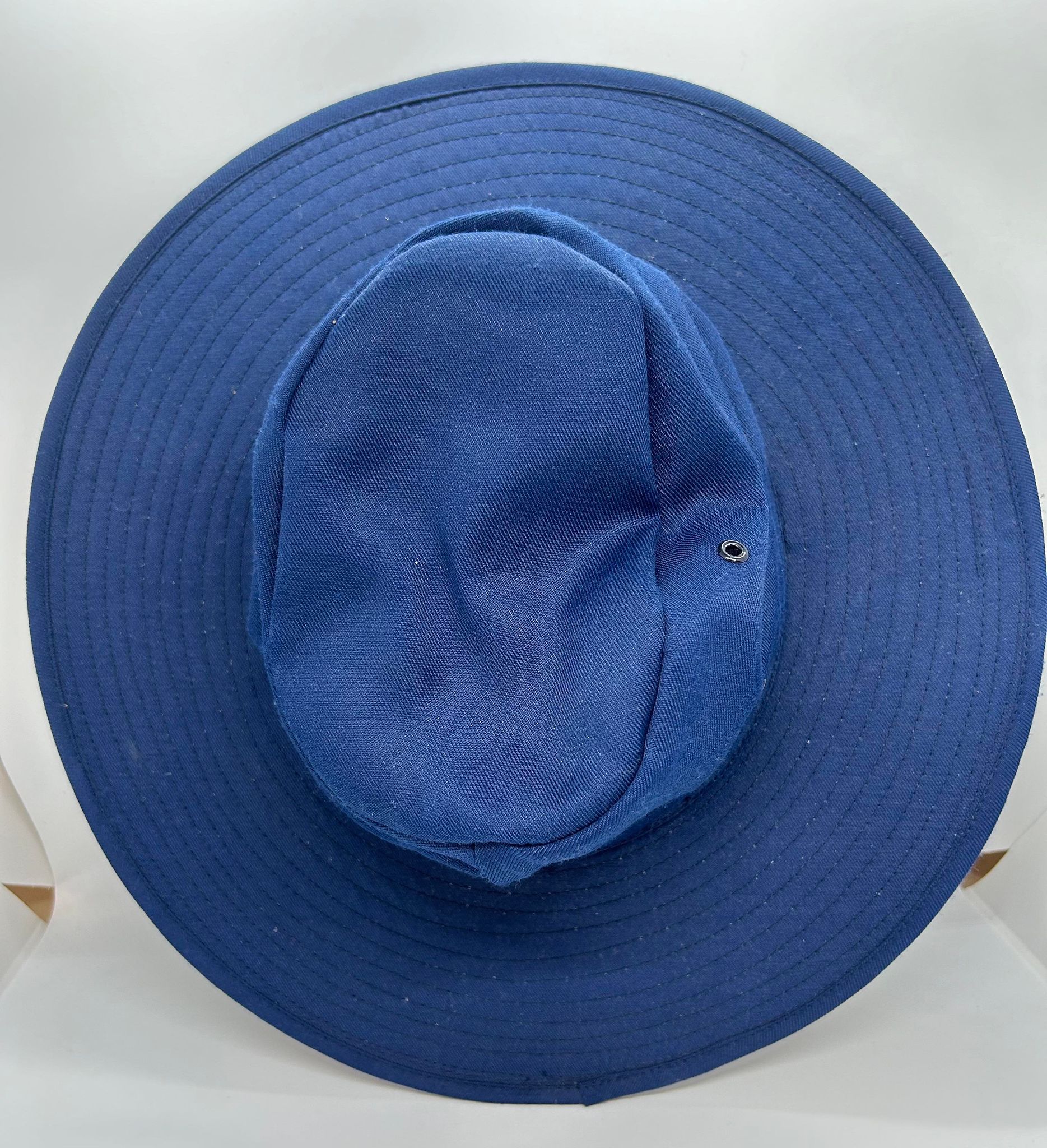 a blue wide brim hat