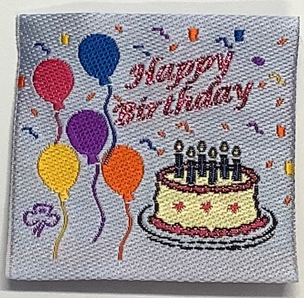 a square unbound badge with a birthday cake and five balloons