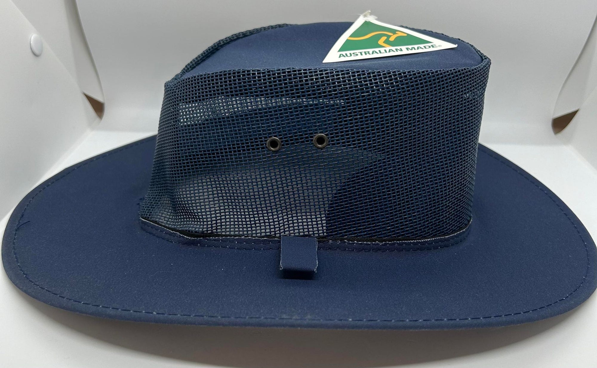a nay blue akubra style hat with a mesh upper part