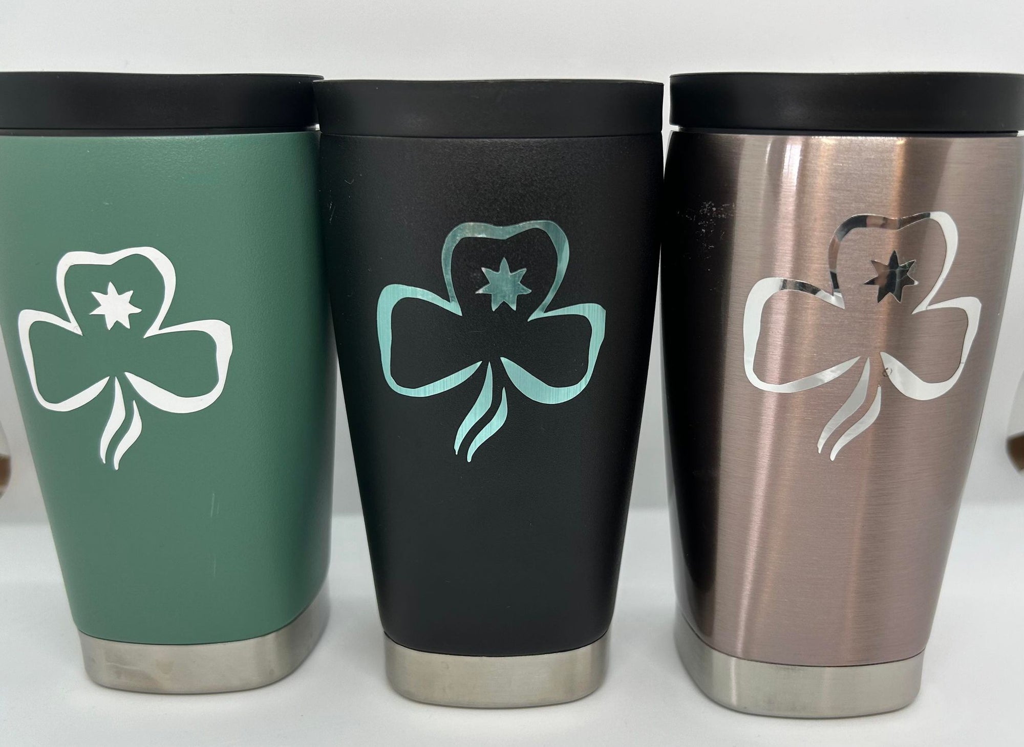 travel cups with trefoil