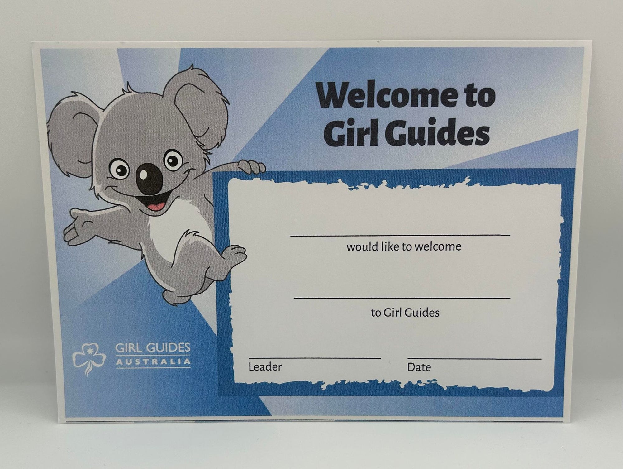 an A5 certificate to welcome new members to guides