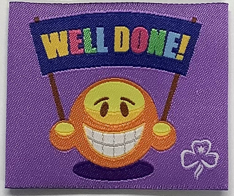 a square unbound purple badge with a smiley face