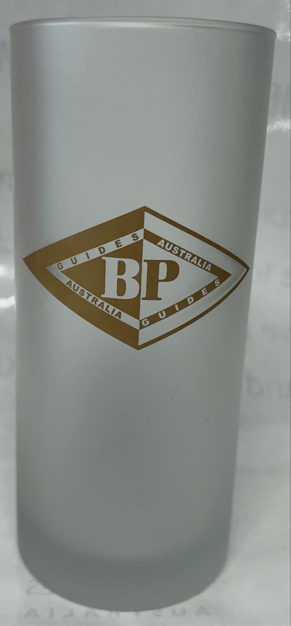 a frosted glass with the BP symbol and the words guides Australia in gold