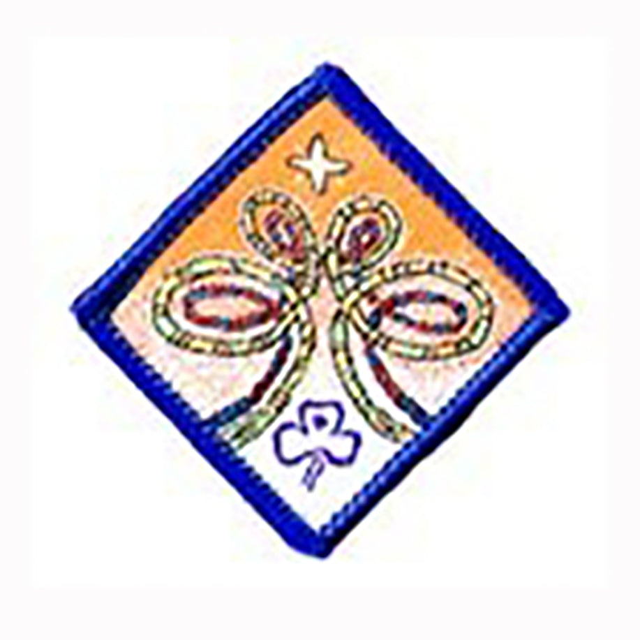 diamond shaped bound in blue badge with twists of rope