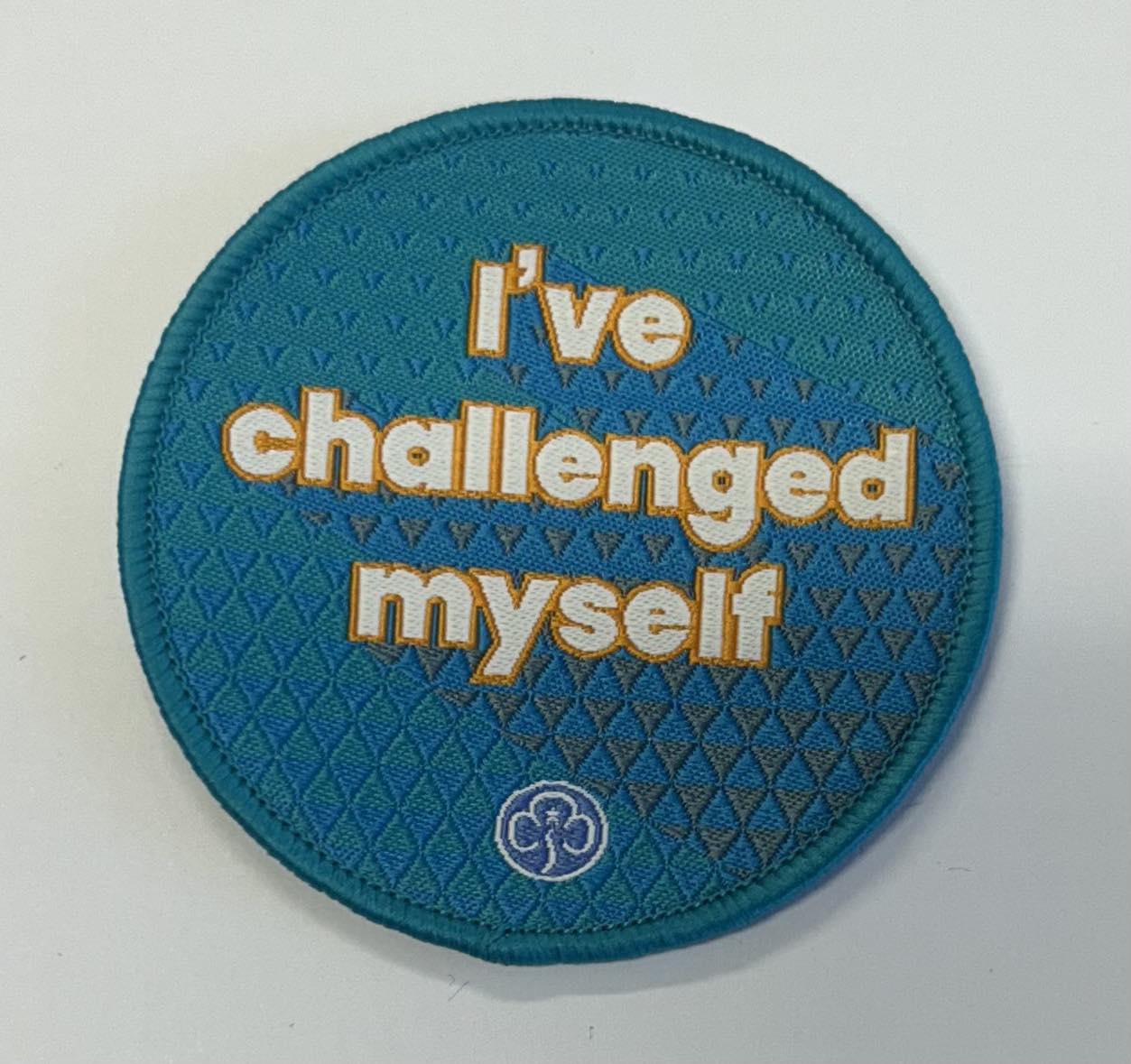 a round blue badge bound in blue with the words I've challenged myself