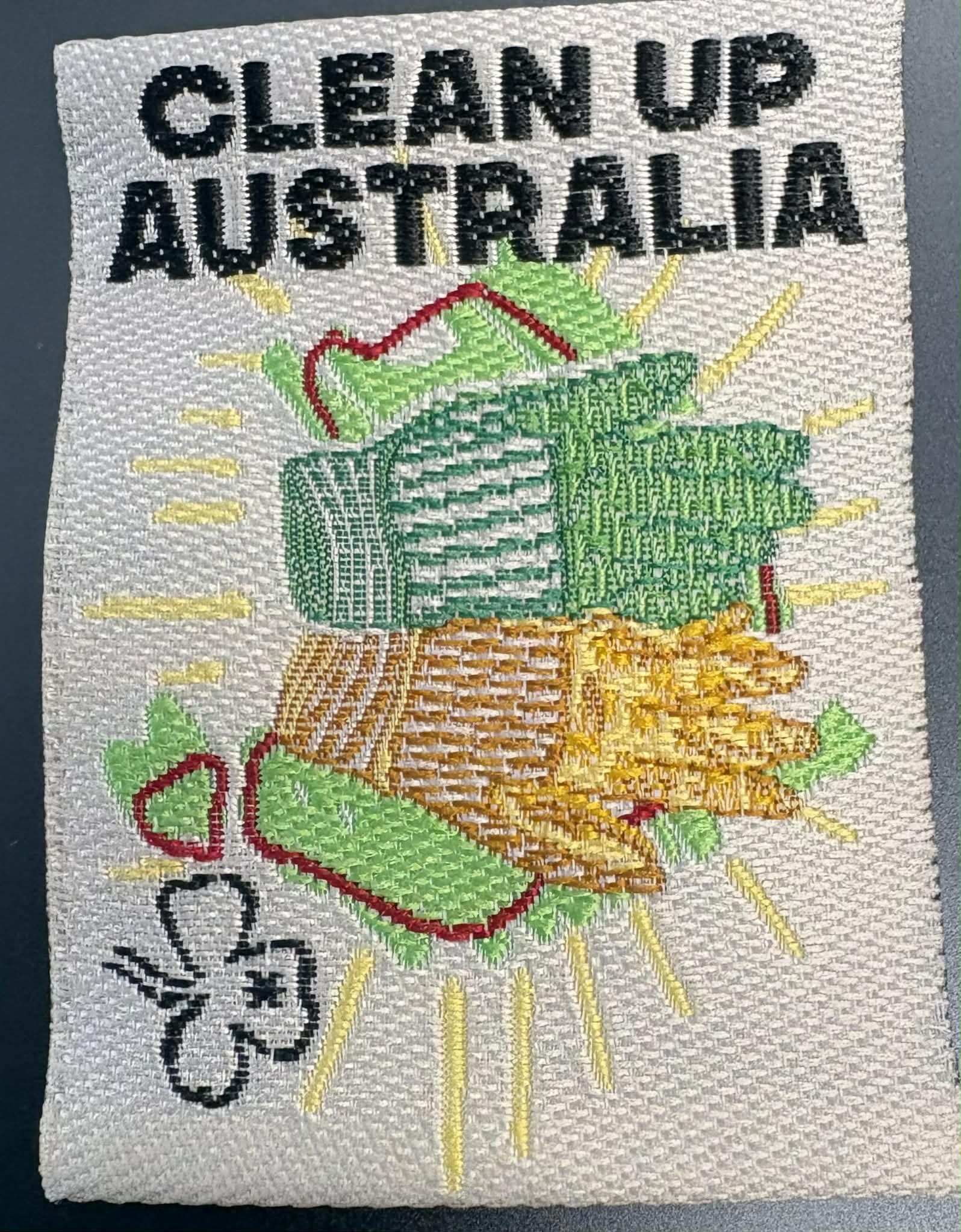 Unbound badge with 'Clean Up Australia' text and images of litter items on a gray background.