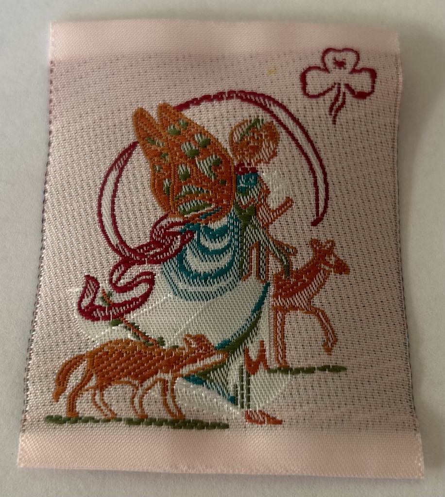 a square unbound light pink badge with a fairy , a fox and a deer