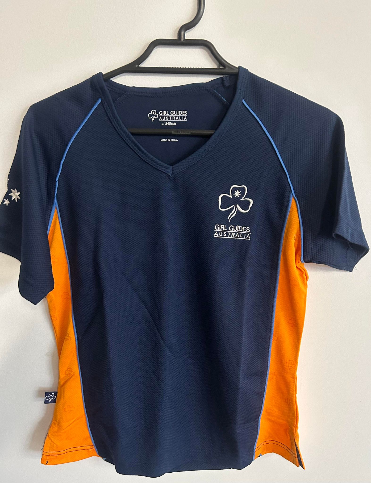 a senior guide uniform shirt that has no collar